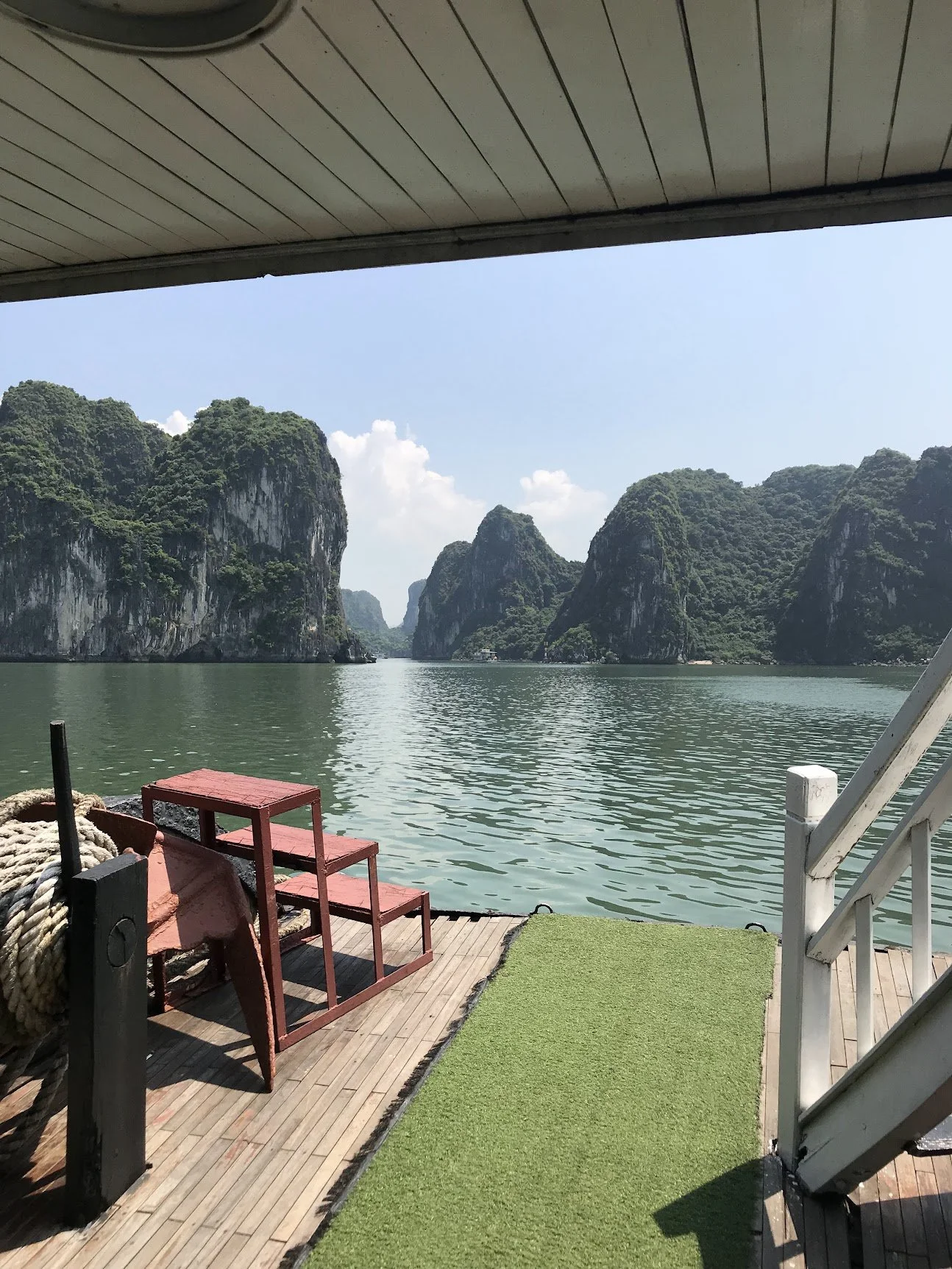 A deck table overlooking the waters of Halong Bay