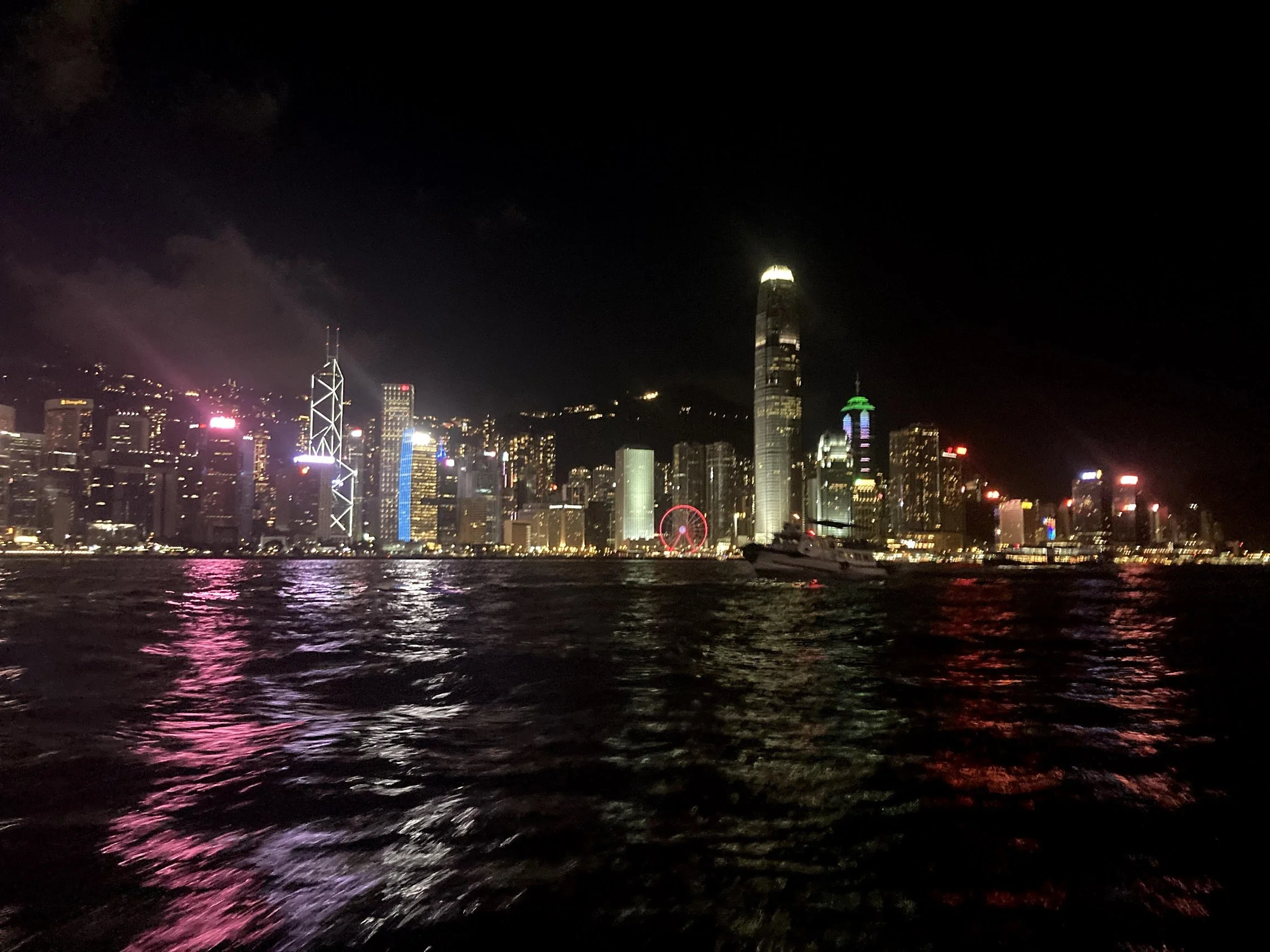 Victoria Harbour and the skyline lit up at night