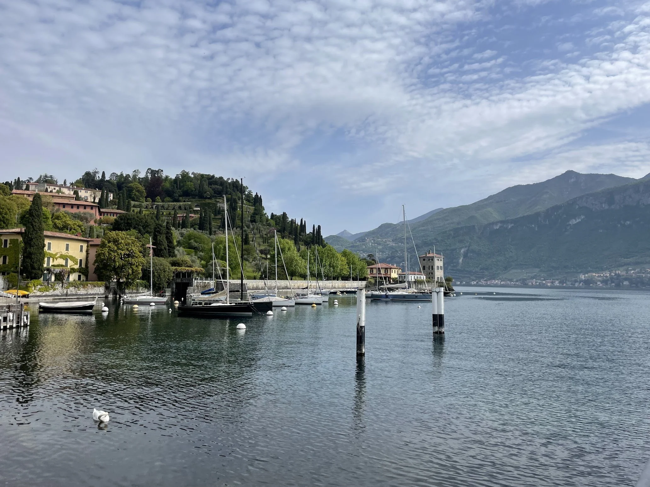 A ferry dock and lakeside village on Lake Como
