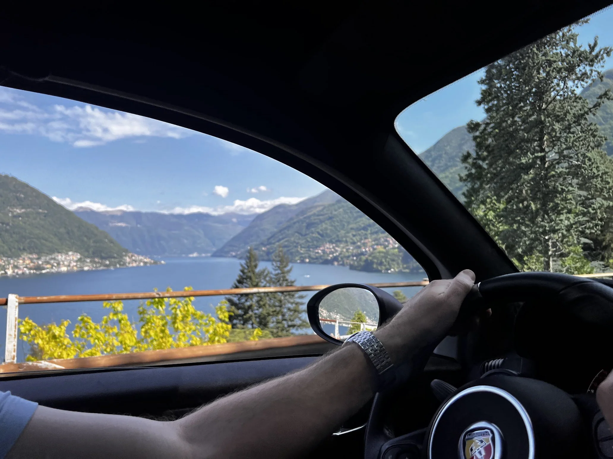 The lake and shoreline road seen from the water