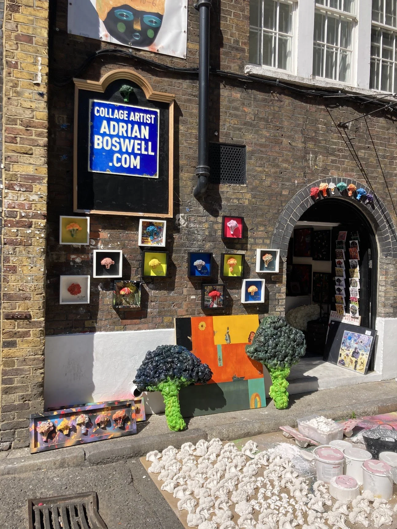 A London pub façade covered in flowers