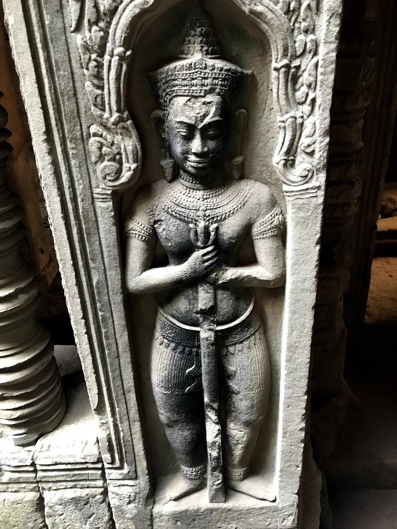 A finely carved apsara relief at Angkor