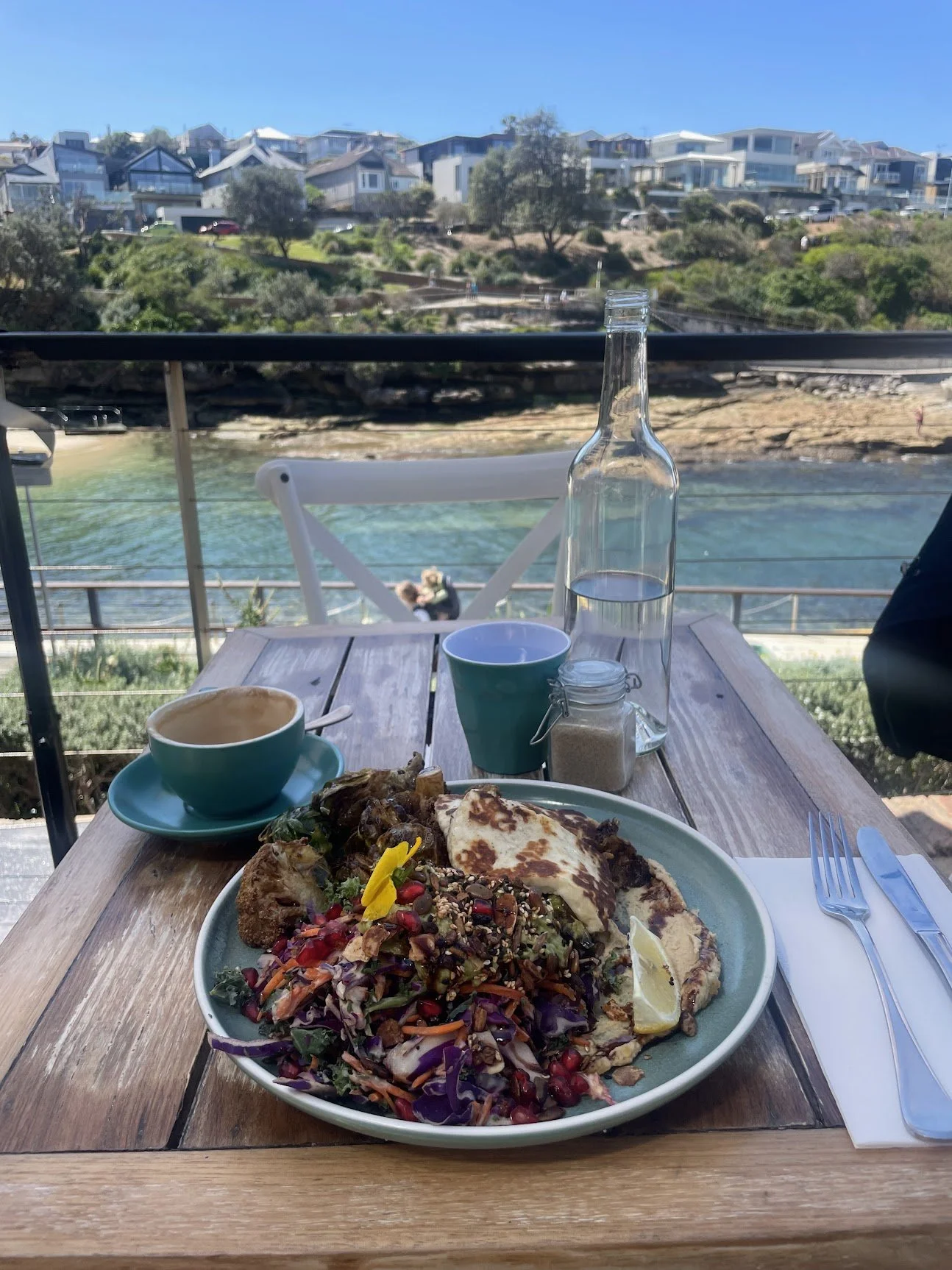 A harbour-view brunch on a sunlit waterfront terrace